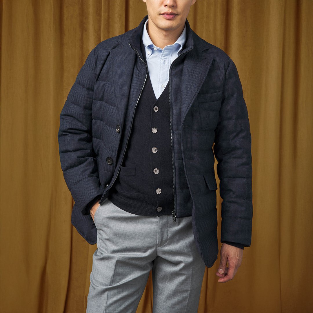 Down Blazer styled over tailoring — clean silhouette with room to move